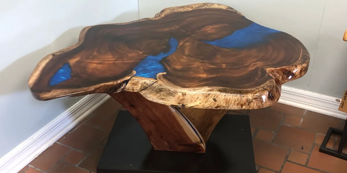 Artistic wood and blue resin furniture