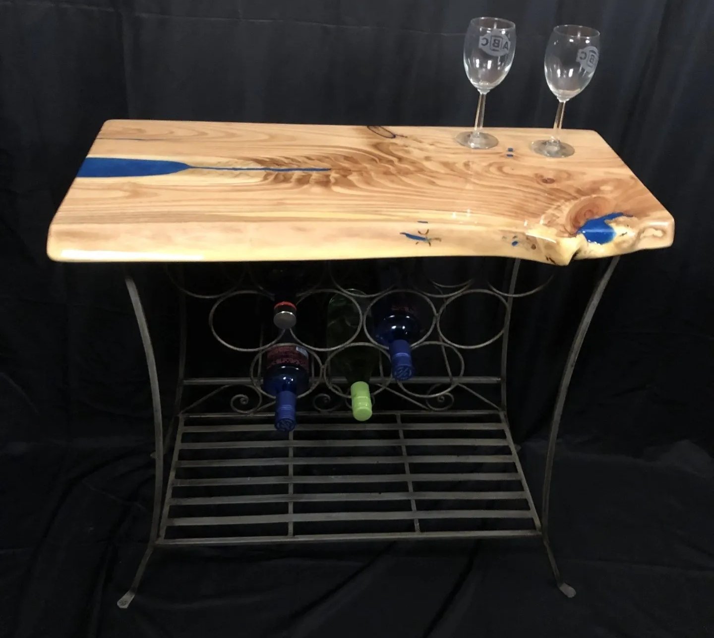 Elegant wine table with decorative surface