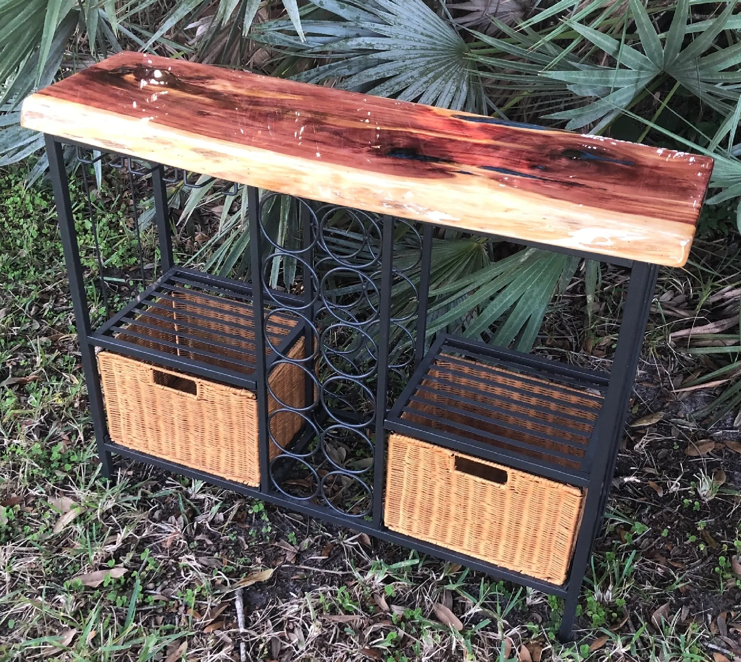 Wood and metal console table outdoors